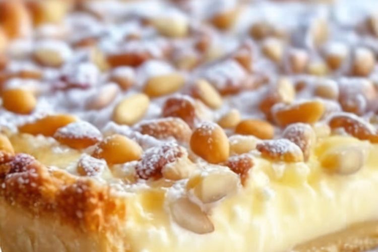 An Italian classic featuring a lemon-scented custard in tender pastry, dusted with powdered sugar.