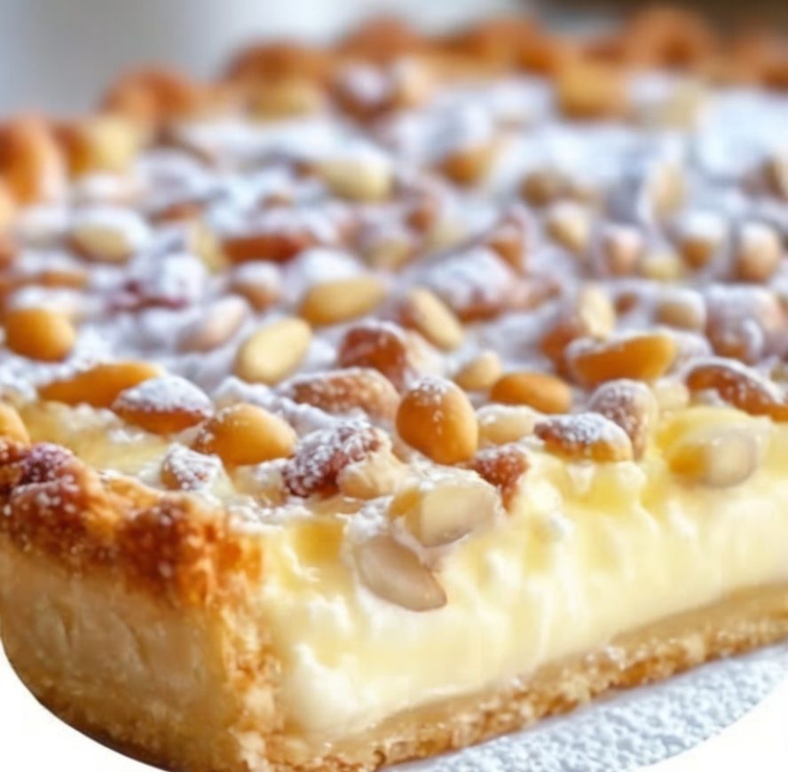 An Italian classic featuring a lemon-scented custard in tender pastry, dusted with powdered sugar.
