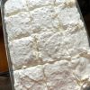 A Southern-style citrus cake made with yellow cake mix, mandarin oranges, pineapple, and whipped topping. Refreshing, creamy, and crowd-approved!