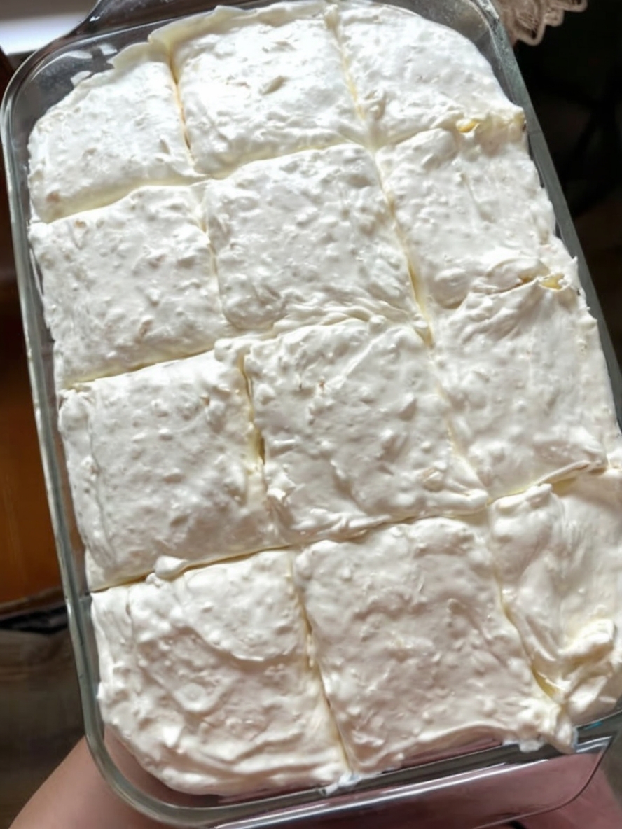 A Southern-style citrus cake made with yellow cake mix, mandarin oranges, pineapple, and whipped topping. Refreshing, creamy, and crowd-approved!