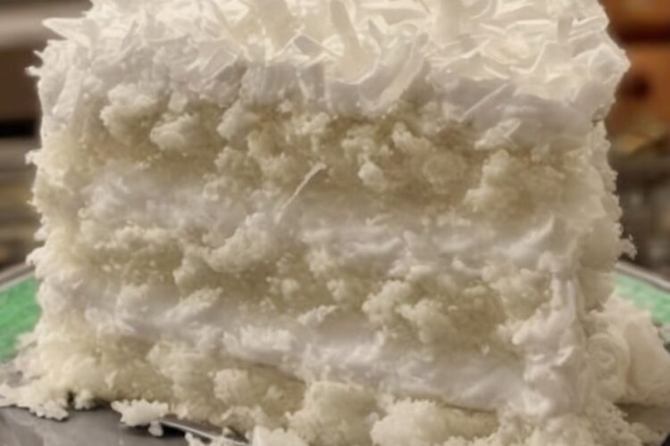 Moist, tropical, and incredibly easy—this coconut poke cake is a crowd-pleasing dessert made with cream of coconut, condensed milk, and whipped topping.