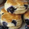 These homemade buttermilk blueberry biscuits are buttery, flaky, and bursting with fresh berries. The perfect easy blueberry breakfast or fruit-filled brunch idea.