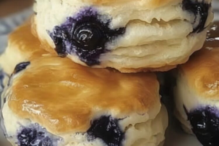 These homemade buttermilk blueberry biscuits are buttery, flaky, and bursting with fresh berries. The perfect easy blueberry breakfast or fruit-filled brunch idea.