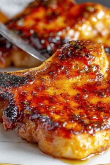 Try this easy pork chop recipe tonight and enjoy the perfect blend of sweet, savory, and sticky that makes weeknight dinners exciting again! Who will you invite over to share these delicious chops?