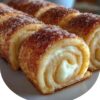 Fluffy rolls swirled with cinnamon sugar and cream cheese, baked golden, and drizzled with glaze. A bakery-worthy treat made at home.