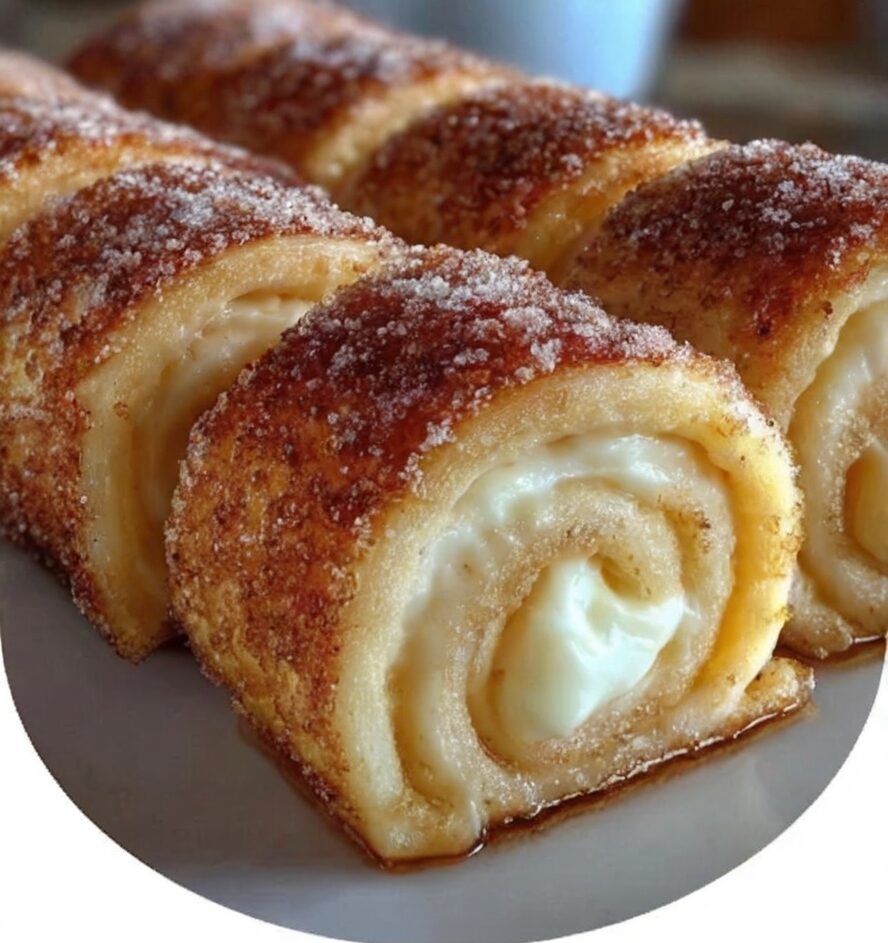 Fluffy rolls swirled with cinnamon sugar and cream cheese, baked golden, and drizzled with glaze. A bakery-worthy treat made at home.