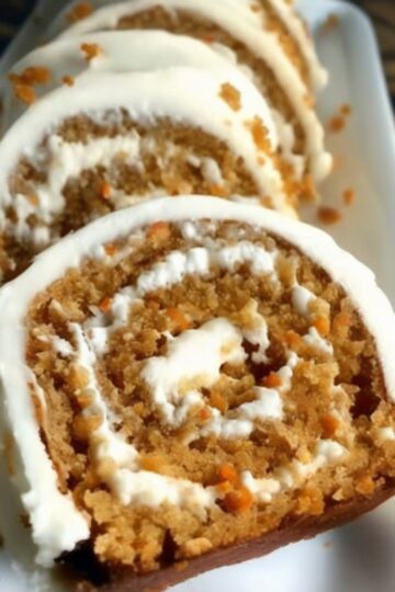 A soft spiced sponge cake rolled with tangy cream cheese frosting. Perfect for holidays, potlucks, or anytime you want an impressive dessert.