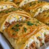 Flaky crescent rolls stuffed with juicy ground beef, melted cheddar, and classic burger flavors. The ultimate quick dinner or snack everyone will love.