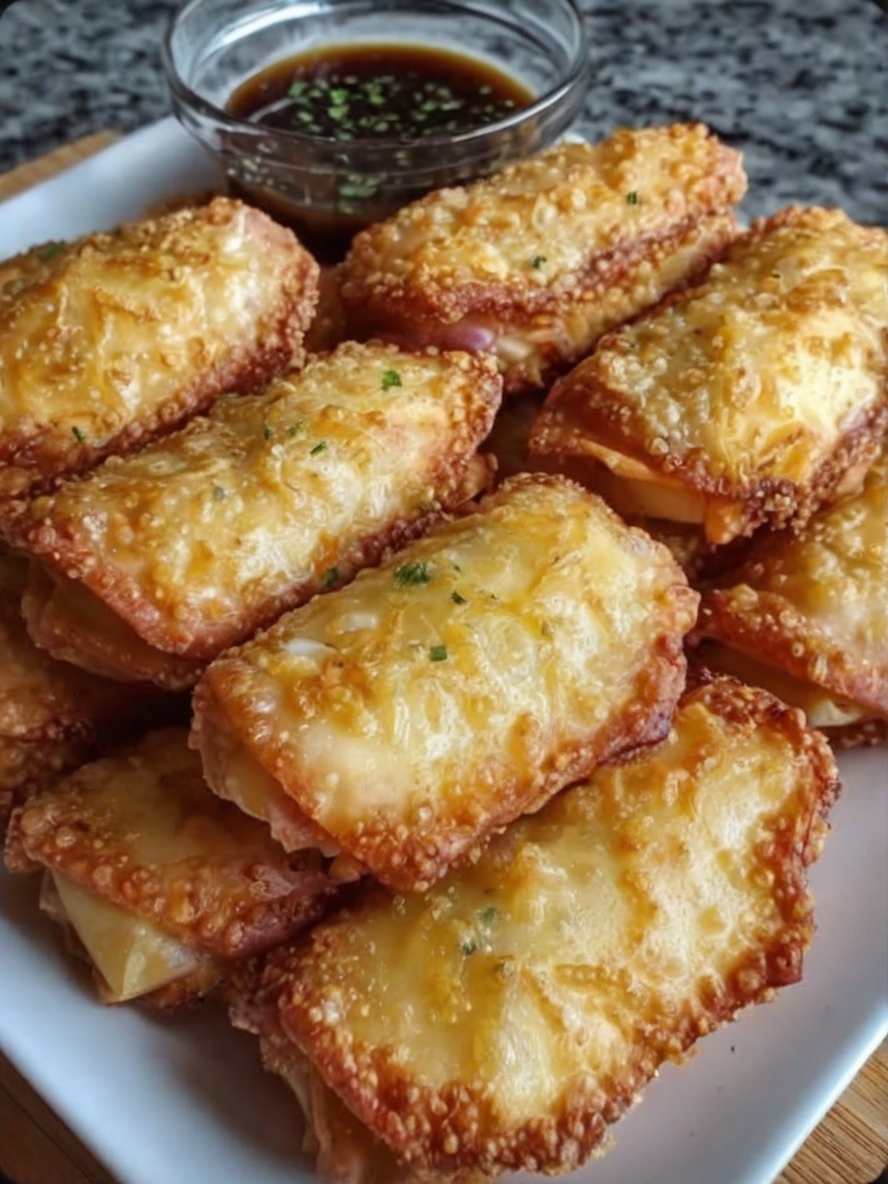 Crispy, creamy, and loaded with crab, these golden-fried egg rolls are the ultimate appetizer. Perfect for game nights, holidays, or anytime a craving hits!