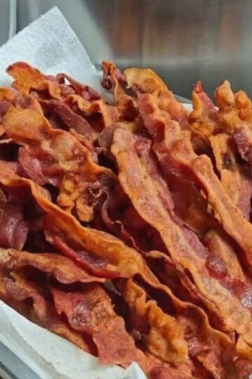 Perfectly crispy, golden bacon with a surprising flour hack that delivers flat, crunchy strips every time.