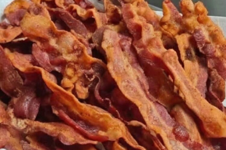 Perfectly crispy, golden bacon with a surprising flour hack that delivers flat, crunchy strips every time.