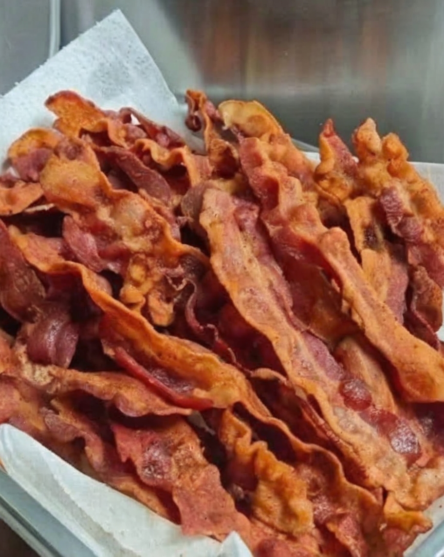 Perfectly crispy, golden bacon with a surprising flour hack that delivers flat, crunchy strips every time.