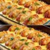 Tender cabbage leaves filled with savory meat and rice, baked over a medley of vegetables in a rich tomato sauce. A wholesome, comforting one-pan meal for any night.
