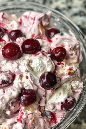 A creamy, no-bake dessert with tangy cream cheese, sweet cherries, and pillowy whipped topping — perfect for potlucks, parties, or a taste of nostalgia.