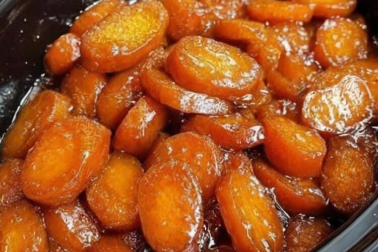 Tender slow-cooked carrots coated in a glossy honey-butter glaze with warm spices and a hint of citrus. A sweet, comforting Amish-style side dish perfect for holidays, Sunday dinners, or easy weeknight meals.