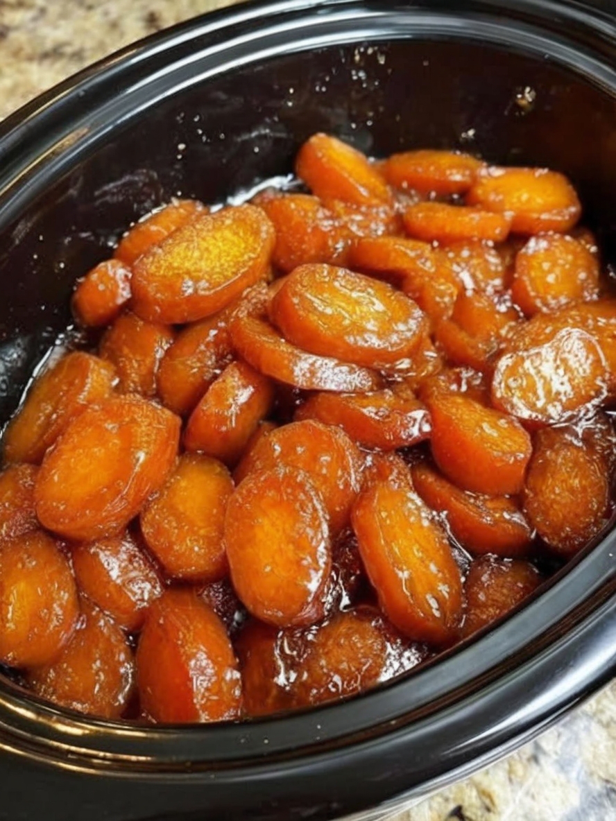 Tender slow-cooked carrots coated in a glossy honey-butter glaze with warm spices and a hint of citrus. A sweet, comforting Amish-style side dish perfect for holidays, Sunday dinners, or easy weeknight meals.