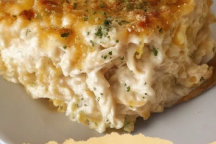 A rich, creamy, cheesy chicken casserole topped with a buttery Ritz cracker crust — the ultimate comfort-food dinner everyone loves.
