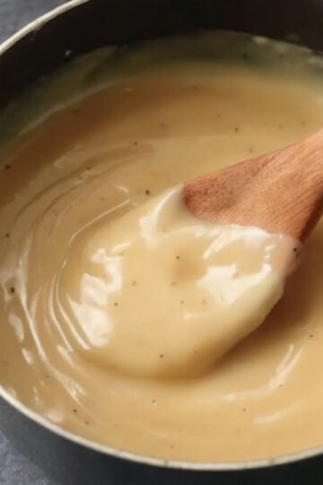 Rich, velvety, and deeply flavorful, this homemade turkey gravy uses pan drippings and turkey stock to create the perfect finishing touch for your Thanksgiving feast.