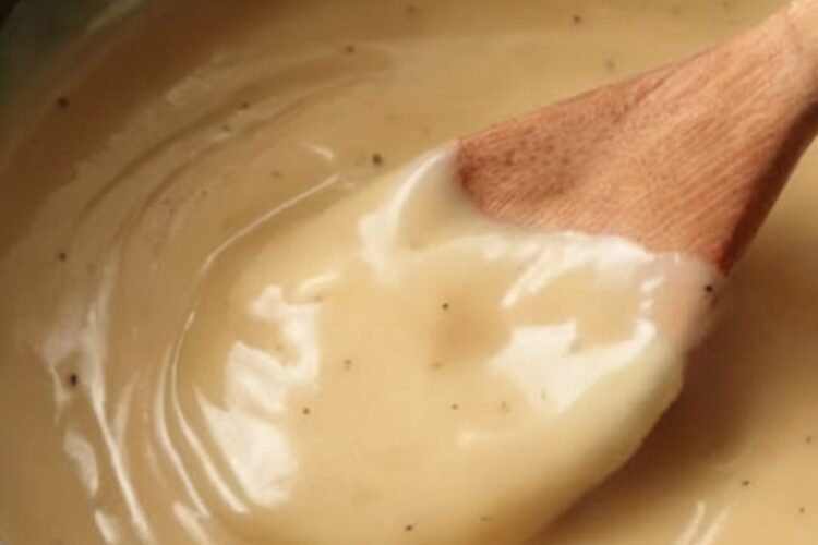 Rich, velvety, and deeply flavorful, this homemade turkey gravy uses pan drippings and turkey stock to create the perfect finishing touch for your Thanksgiving feast.