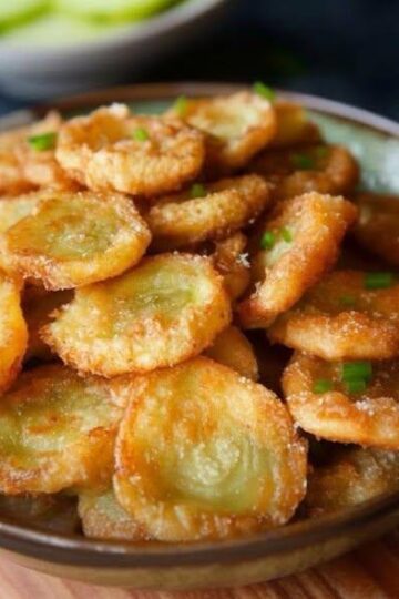 Golden, crunchy fried pickle chips with bold, tangy flavor—perfect for dipping, snacking, and sharing.