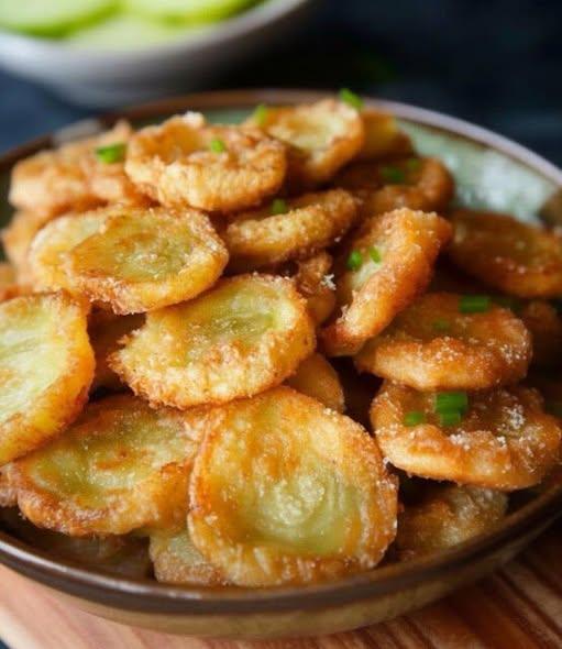Golden, crunchy fried pickle chips with bold, tangy flavor—perfect for dipping, snacking, and sharing.