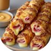 Warm, golden crescent rolls wrapped around melty cheese and savory ham — the easiest, most addictive snack or appetizer.