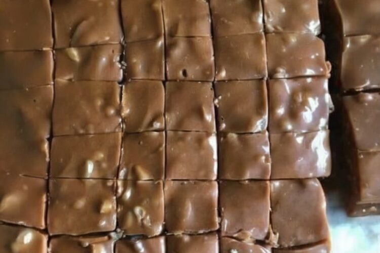 Silky smooth fudge layered with rich caramel for a decadent, melt-in-your-mouth treat perfect for gifting or celebrating.