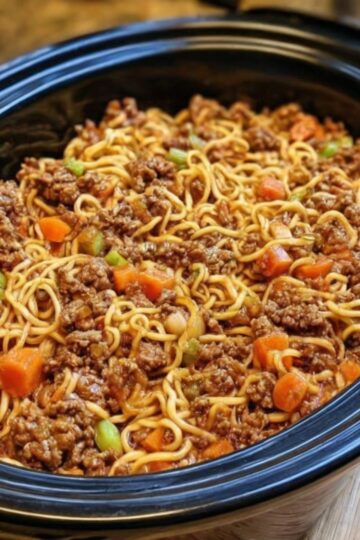 A creamy, savory Midwestern casserole topped with golden, crunchy chow mein noodles — pure comfort food nostalgia.