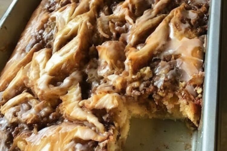 A soft, fluffy cake with rich cinnamon swirls and creamy glaze — all the comfort of cinnamon rolls without the work.