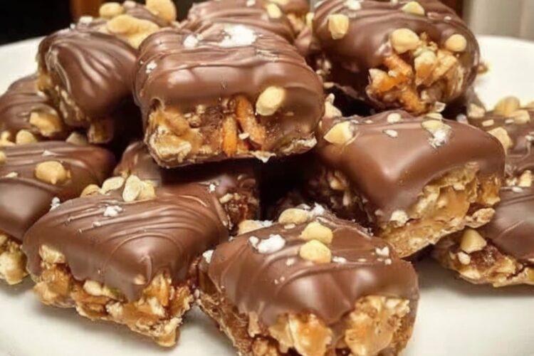 Sweet, salty, crunchy clusters made with pretzels, peanut butter, honey, and chocolate — an easy no-bake treat perfect for snacks, gifting, or parties.