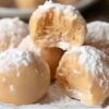 Rich, creamy, no-bake peanut butter balls made with cream cheese and powdered sugar — an effortless dessert that melts in your mouth.