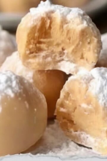 Rich, creamy, no-bake peanut butter balls made with cream cheese and powdered sugar — an effortless dessert that melts in your mouth.
