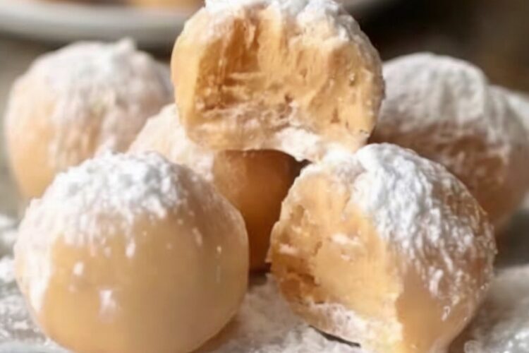 Rich, creamy, no-bake peanut butter balls made with cream cheese and powdered sugar — an effortless dessert that melts in your mouth.