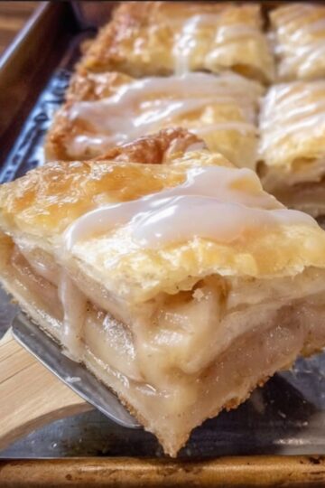 Thick, bakery-style apple slices with a crisp double crust and juicy cinnamon filling that slices clean every time.