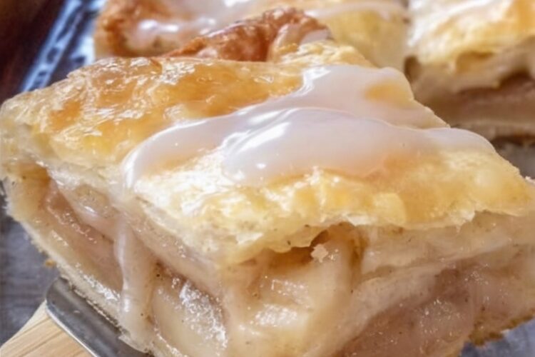 Thick, bakery-style apple slices with a crisp double crust and juicy cinnamon filling that slices clean every time.