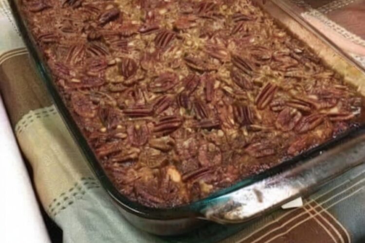 A genius mashup of classic pecan pie and easy cobbler, with layers of buttery pie crust sandwiching a rich, gooey pecan filling. All the flavor of traditional pecan pie with none of the fuss, baked in a pan that feeds a crowd.