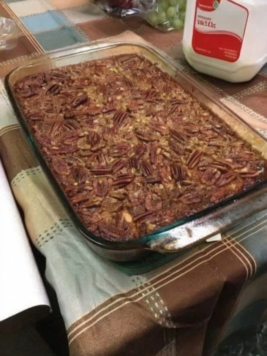 A genius mashup of classic pecan pie and easy cobbler, with layers of buttery pie crust sandwiching a rich, gooey pecan filling. All the flavor of traditional pecan pie with none of the fuss, baked in a pan that feeds a crowd.