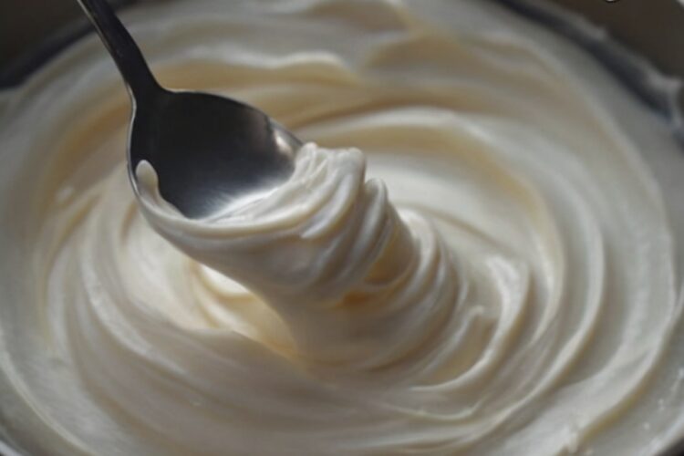 A smooth, pipeable buttercream that dries firm for stacking but stays tender when bitten — perfect for decorated cookies.