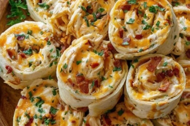Flaky crescent dough rolled with creamy ranch chicken, bacon, and cheddar, baked until golden and irresistible. The perfect party appetizer or snack.