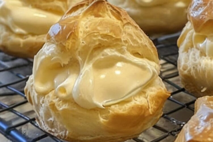 Light, flaky puff pastry filled with smooth vanilla custard and dusted with powdered sugar — an elegant dessert made simple.