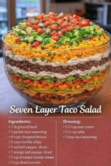 A stunning, crowd-pleasing layered salad with seasoned ground beef, black beans, crisp lettuce, tomatoes, cheddar cheese, olives, sour cream, and salsa. Every scoop delivers a perfect combination of savory, creamy, crunchy, and fresh flavors. Perfect for potlucks, parties, and weeknight dinners.