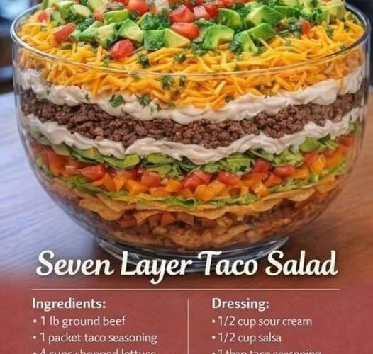 A stunning, crowd-pleasing layered salad with seasoned ground beef, black beans, crisp lettuce, tomatoes, cheddar cheese, olives, sour cream, and salsa. Every scoop delivers a perfect combination of savory, creamy, crunchy, and fresh flavors. Perfect for potlucks, parties, and weeknight dinners.