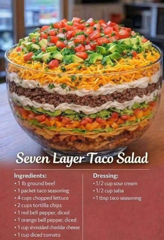 A stunning, crowd-pleasing layered salad with seasoned ground beef, black beans, crisp lettuce, tomatoes, cheddar cheese, olives, sour cream, and salsa. Every scoop delivers a perfect combination of savory, creamy, crunchy, and fresh flavors. Perfect for potlucks, parties, and weeknight dinners.