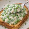 The humble, old-fashioned comfort classic that deserves a serious revival. Tender green peas in a smooth, buttery béchamel sauce spooned generously over crispy buttered toast. Simple, satisfying, and ready in under 15 minutes with pantry staples.