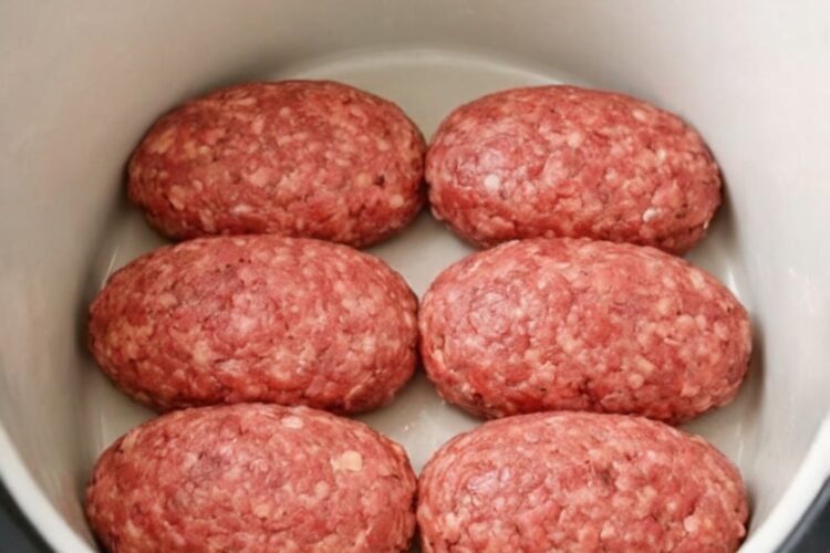 Fork-tender oval beef patties slow-cooked in rich, savory mushroom gravy made from just four simple ingredients. This cozy, budget-friendly comfort food dinner practically makes itself and tastes like it came from your favorite diner. Perfect over mashed potatoes with extra gravy.