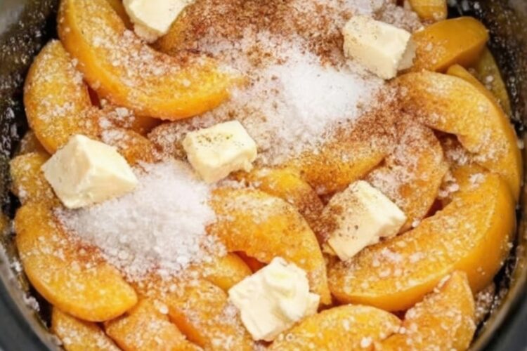 The ultimate easy dessert: canned peaches topped with dry cake mix and dotted with butter, then slow-cooked into bubbling, golden perfection. No mixing, no measuring beyond opening cans, no technique required. Just dump, dot, and walk away. Serve warm with vanilla ice cream for the easiest crowd-pleaser you'll ever make.