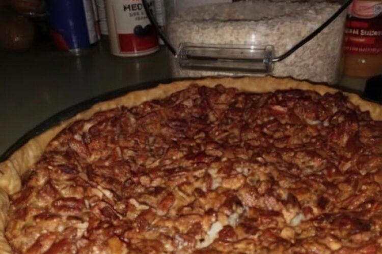 Pecan Pie with Secret Cream Cheese Layer The pecan pie that changes everything: a hidden layer of tangy, silky cream cheese beneath the classic sweet, crunchy pecan topping. The cream cheese balances the sweetness and adds incredible richness that makes this pie unforgettable. Your new signature dessert. Equipment: 9-inch pie pan, 2 medium mixing bowls, electric mixer or whisk, rubber spatula, measuring cups and spoons, wire cooling rack Prep Time: 20 minutes Bake Time: 45-55 minutes Cool Time: 2-3 hours Total Time: 4 hours Yields: 8-10 slices Ingredients: For the Cream Cheese Base: 8 oz cream cheese, softened ⅓ cup granulated sugar ¼ teaspoon salt 1 teaspoon vanilla extract For the Pecan Topping: 3 large eggs 1 cup light corn syrup 1 cup packed light brown sugar ¼ cup unsalted butter, melted 1 teaspoon vanilla extract 1½ cups pecan halves For the Crust: 1 (9-inch) unbaked pie crust Instructions: Preheat oven to 350°F (175°C). Place pie crust in 9-inch pie pan. In medium bowl, beat softened cream cheese with electric mixer or whisk until smooth and creamy with no lumps. Add sugar and salt, beating until completely combined and fluffy. Stir in vanilla until well mixed. Using rubber spatula, spread cream cheese mixture evenly across bottom of unbaked pie crust, creating smooth, uniform layer covering entire bottom and reaching edges. In another medium bowl, whisk eggs until well beaten and slightly frothy. Add corn syrup, brown sugar, melted butter, and vanilla. Whisk vigorously until completely smooth, sugar dissolved, and well combined. Should be glossy and pourable. Gently stir pecan halves into syrup mixture, coating every pecan evenly. Carefully pour pecan mixture over cream cheese layer. Work slowly to avoid disturbing cream cheese base. Use fork to arrange pecans evenly across top for beautiful presentation. Place pie on baking sheet. Bake 45-55 minutes until filling is set around edges and center has slight jiggle. Knife inserted near center should come out mostly clean. Pecans should be deeply toasted. Cover crust edges with foil after 30 minutes to prevent over-browning. Cool completely on wire rack for at least 2-3 hours, or refrigerate 4-6 hours or overnight. Cream cheese layer needs time to set and filling needs to firm up. Slice and serve at room temperature or chilled. Top with whipped cream or vanilla ice cream if desired. Notes: Cream cheese must be completely softened—room temperature for 1 hour or microwave 10-15 seconds. Cold won't spread smoothly and creates lumps. Must cool completely for clean slices and proper texture. Cutting while warm = runny mess. Patience crucial. Use pie shield or cover crust edges with foil after 30 minutes to prevent over-browning. Room temperature eggs mix more smoothly into filling for uniform texture. Take moment to arrange pecans beautifully—this pie is a showstopper. Delicious at room temp or chilled. Chilled makes cream cheese layer more prominent. Add bourbon: Stir 2 tablespoons bourbon into pecan filling for Southern depth. Try maple: Replace half corn syrup with pure maple syrup for complex sweetness. Make it chocolate: Add ½ cup chocolate chips to pecan mixture for turtle pie. Orange zest: Stir 1 tablespoon orange zest into cream cheese layer for brightness. Dark brown sugar creates deeper, more molasses-forward flavor. Toast pecans first to intensify nutty flavor. Mini pies: Use muffin tin with pie crust rounds. Reduce baking time to 25-30 minutes. Add espresso: Mix ½ teaspoon instant espresso powder into filling for coffee notes. Different crust: Graham cracker or shortbread crust both work beautifully. Cream cheese layer mixed with filling: Cream cheese not spread evenly or poured too aggressively. Spread smooth and even, pour gently. Without corn syrup: Substitute golden syrup or combo of maple syrup and honey. Texture slightly different. Done when: Edges set and puffed, center has slight jiggle, knife near center comes out mostly clean. Chopped pecans: Can use but halves create classic, beautiful top. Chopped works but less impressive. Must refrigerate due to cream cheese layer. Store covered in fridge. Cover and refrigerate up to 5 days. Actually improves after day or two as flavors meld. Freezes beautifully. Wrap tightly in plastic then foil up to 2 months. Thaw overnight in fridge. Ideal make-ahead. Bake 2-3 days before serving and refrigerate. Flavors develop with time. Serve: Room temp or chilled with whipped cream, vanilla ice cream, or caramel drizzle. For cleanest slices, dip knife in hot water and wipe between cuts. Pairs with: Strong black coffee, bourbon, sweet dessert wine like Sauternes.