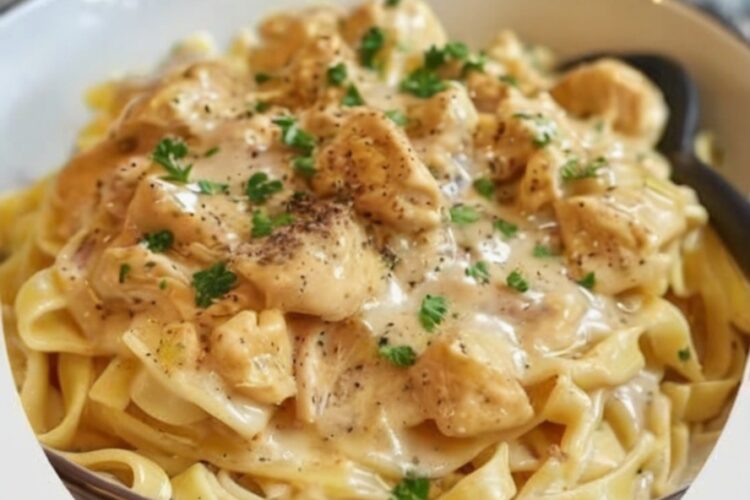 The ultimate dump-and-go dinner: chicken breasts bathed in a creamy, savory sauce made from Italian dressing mix, golden mushroom soup, and cream cheese. No browning, no prep—just layer everything and walk away. Serve over rice or noodles for the easiest comfort food dinner that tastes like you actually tried.