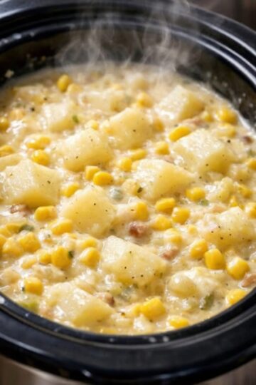Thick, creamy, and deeply comforting chowder that practically cooks itself. Tender potatoes and sweet corn simmer all day in a rich broth, then get finished with cream and butter for ultimate comfort food. Perfect for busy weeknights with minimal effort and maximum flavor.