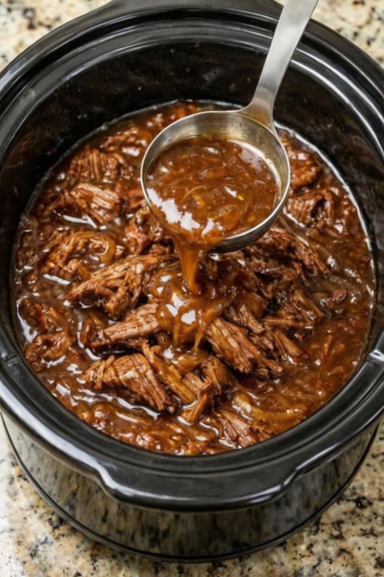 Fork-tender chuck roast swimming in a rich, glossy balsamic glaze that's naturally reduced and deeply complex. With just three ingredients and your slow cooker, create a showstopping meal that tastes like you spent all day cooking. Perfect for company or easy weeknight dinners.